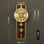 horloge murale chinoise bien être or bois fixation cadran métal motif caractère