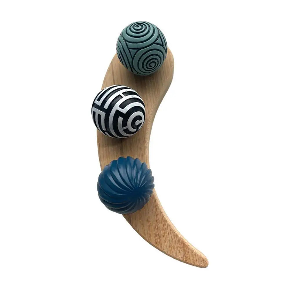 boules décoratives motif gravé spirales lignes horizontales support bois salon entrée table basse