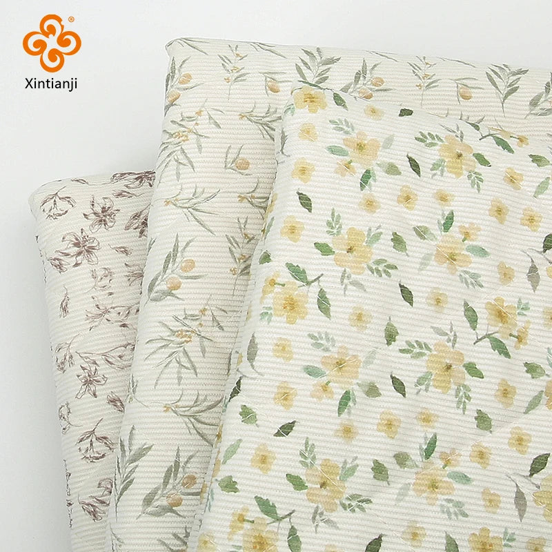 tissu polyester imprimé fleurs jaunes vertes veste hiver rayures horizontales poches col montant bricolage