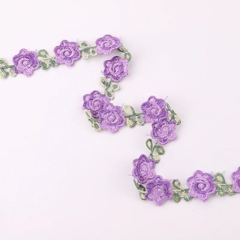 ruban décoratif brodé fleurs rose violet jaune vert polyester largeur cm fleurs brodées opaquet