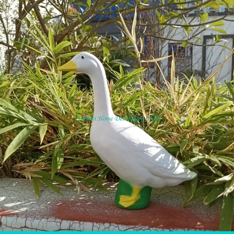 canard jardin résine plumes gravées blanc jaune vert rustique dimension 18cm 15.5cm 7cm