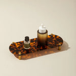 plateau acrylique léopard moderne porte maquillage rangement intérieur chic élégant