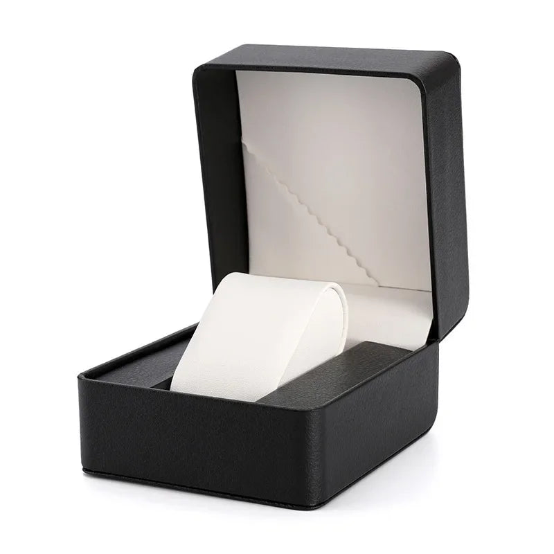 montre vintage cuir noir fond orange boite rangement elegante exposition