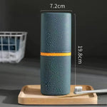 tasse pliable moderne brosse dents crème dentifrice blanc rose bleu gris texture goutte'eau