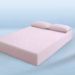 parure lit bleu clair drap housse élastique deux oreillers coton doux chambre moderne