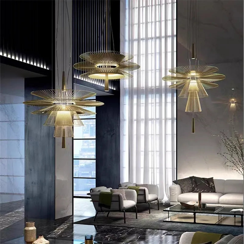 suspension lumineuse or noir contemporain minimaliste ampoule led intégrée fixation câbles métal superposé