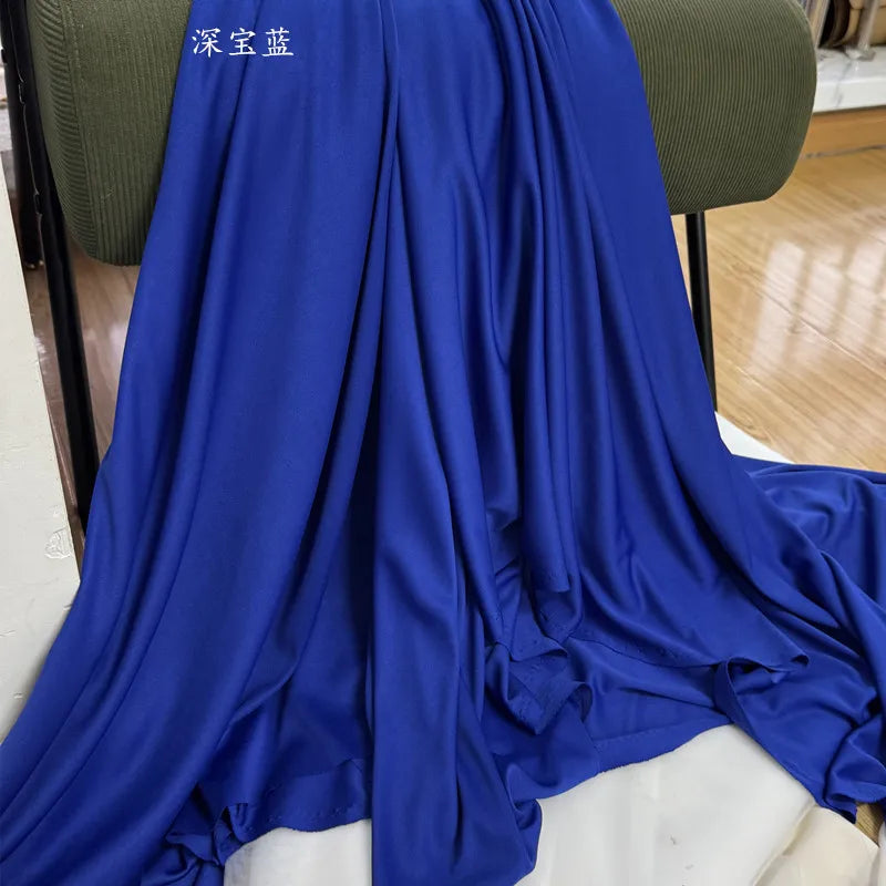 rideau tissu élastique soie lait bleu royal antidérapant moderne boules argentées
