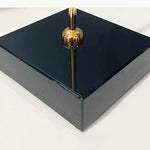 Bougeoir moderne transparent doré papillons bleu rayures base carrée noire tige dorée