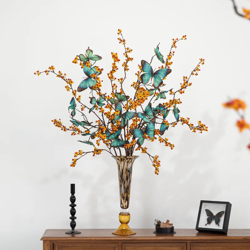 vase verre ambré motif moucheté moderne décoration intérieure bougie papillon fleurs violettes chandelier