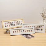 cadres photo standing rectangulaires blancs beiges minimalistes modernes transparents décoration maison portraits