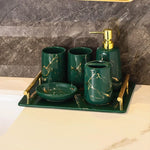 ensemble porte brosse dents porte savon marbre moderne or noir élégant bouteille parfum fleurs