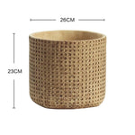 Pot plante tissé marron clair moderne rustique plante verte graines noires serviette blanche