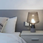 lampe table moderne transparente gris beige base béton éclairage LED haute qualité certifiée VDE
