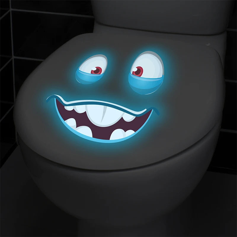 stickers toilette visage souriant yeux grands ouverts cartoon lumineux adhésifs salle bain bleu blanc