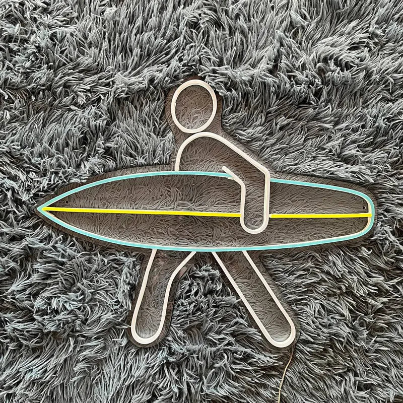 néon lumineux surfman silhouette planche surf couleur bleue jaune verte led moderne minimaliste