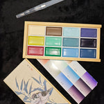 palette peinture aquarelle multicolore compartiments traditionnelle boite bois artiste illustration oiseaux
