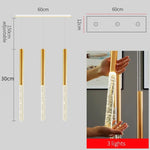 suspension lumineuse moderne or blanc brillantes élégante verre fixée chaînes