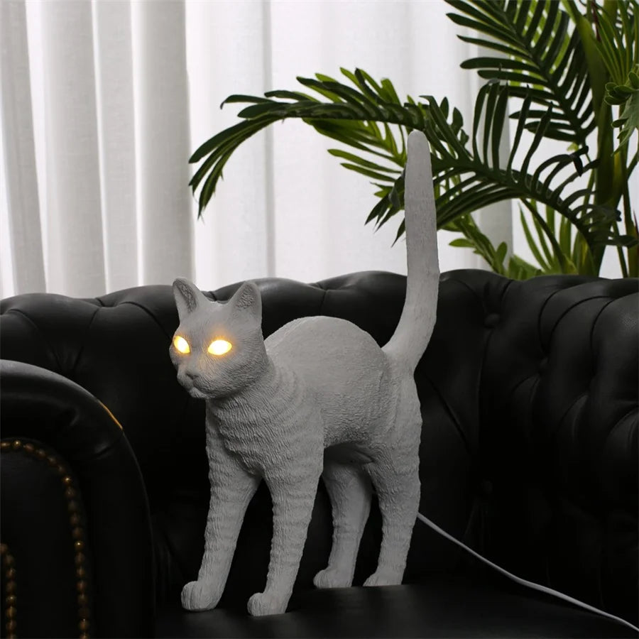 statue chat noir résine texture grumeleuse tasse soucoupe vase fleurs artificielles