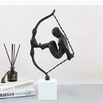 Sculpture moderne tête tête noir blanc socle pierre bouteille diffuseur livresscrição