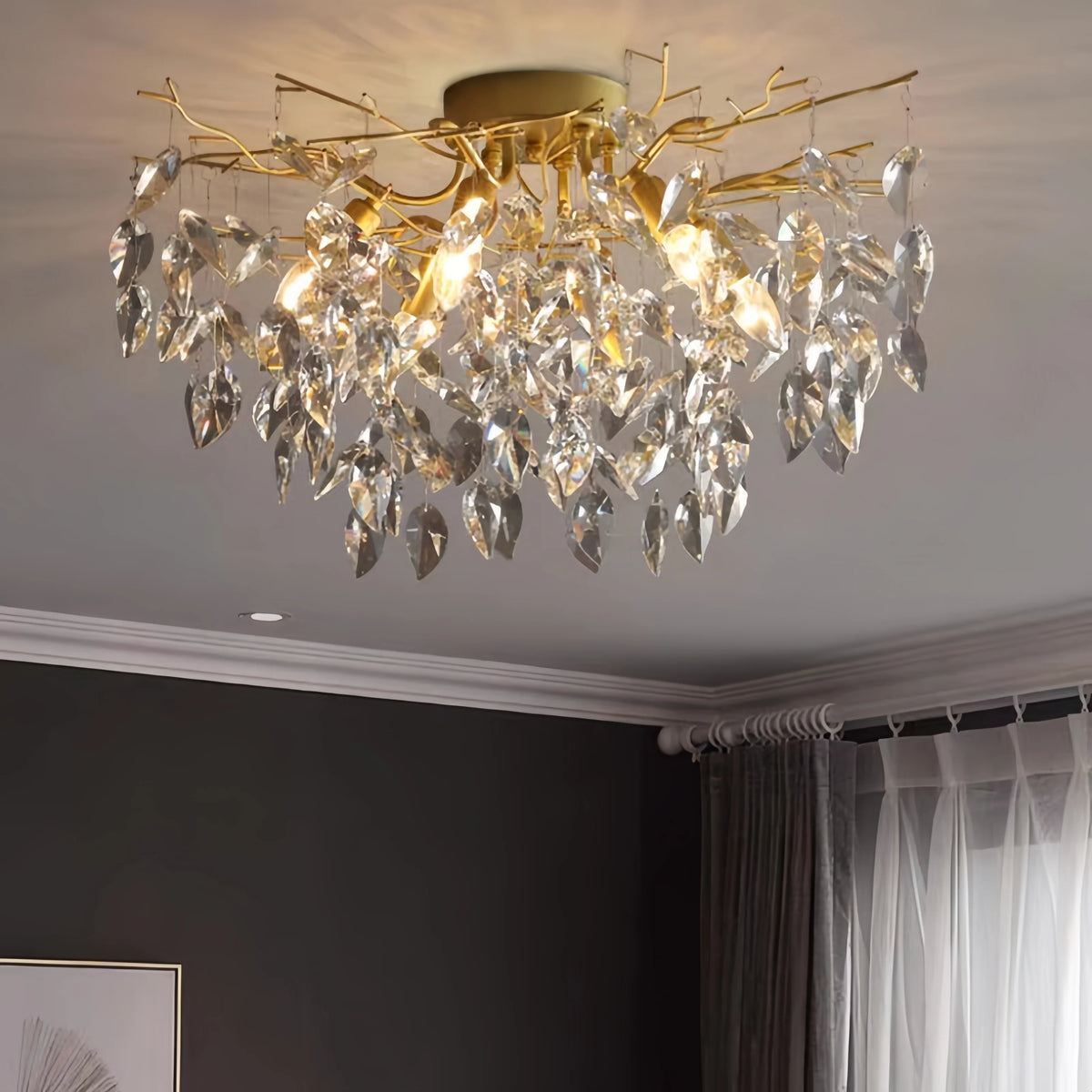 lustre cristal moderne élégant doré feuilles stylisées lumière froide naturelle chaude chambre salon