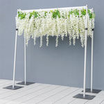 décoration murale fleurs blanches feuilles vertes structure métallique événement mariage anniversaire party moderne