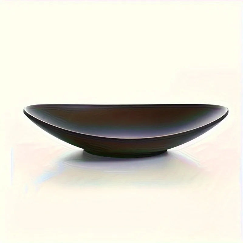 assiettes ovales noires modernes matières lisses décoratives contemporaines présentation bijoux éléments sophistiqué