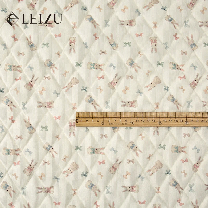 tissu imprimé fleurs lapins blanc rose vert bleu clair vintage enfantin résistant déchirure bricolage
