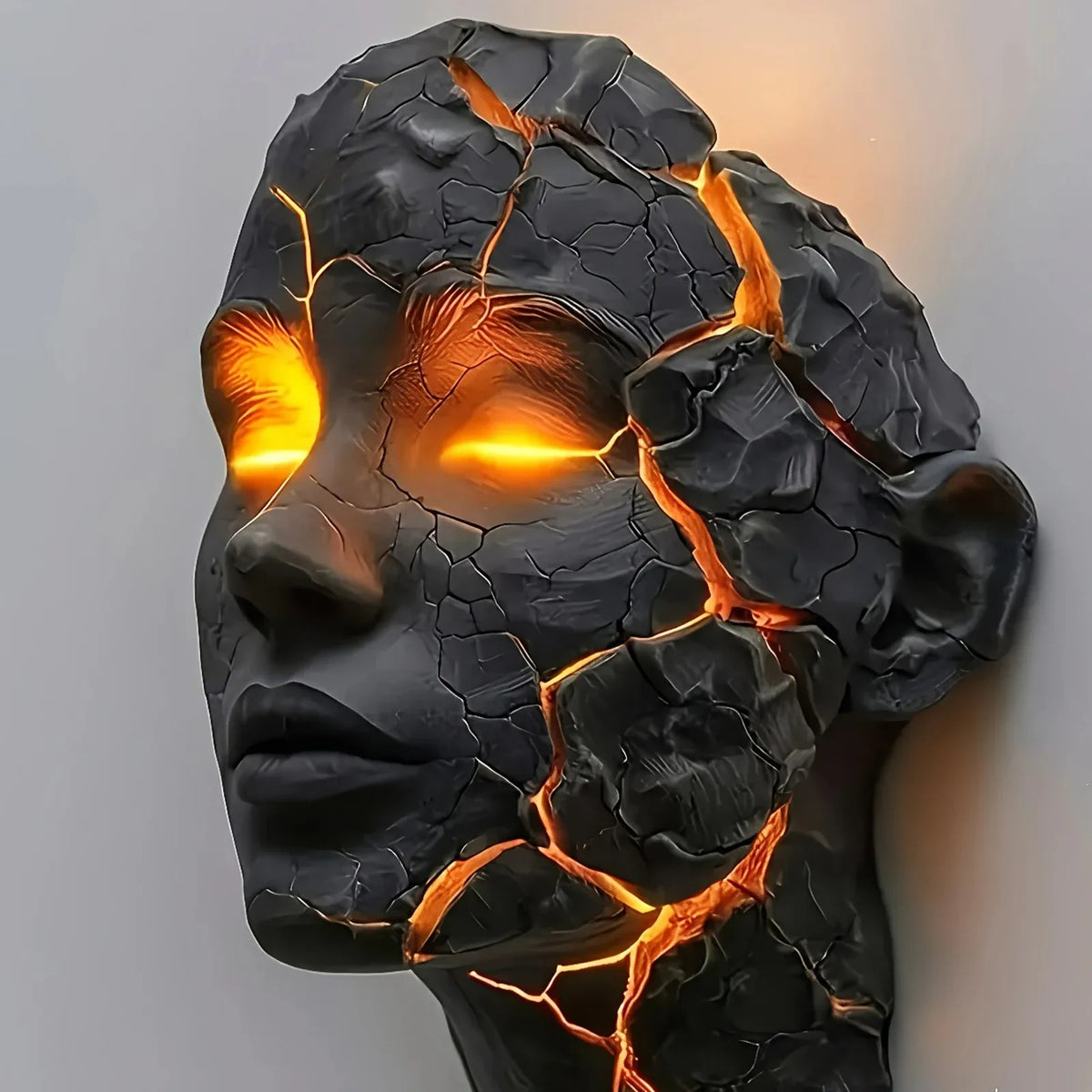 masque sculptural noir orange texture craquelée effet lave art contemporain sans fixation visible