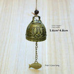 cloche décorative artisanale bronze doré motifs poissons oiseaux vintage(chaines bois)