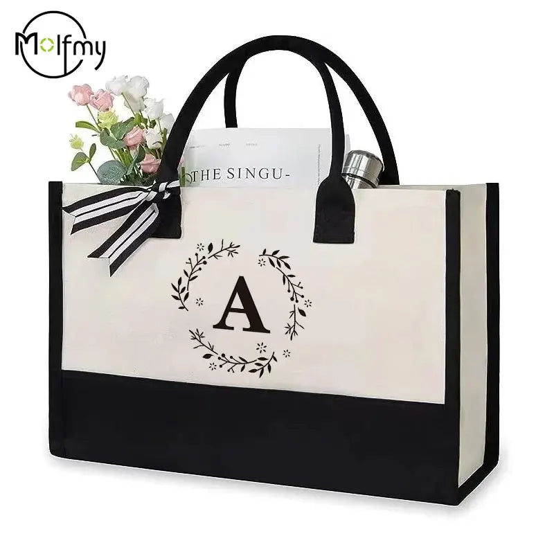 sac main toile lettres fleurs classique poignées noires décoration féminine