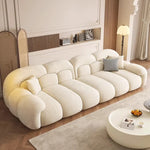 canapé moderne beige corduroy coussins décoratifs bois minimaliste salon maison