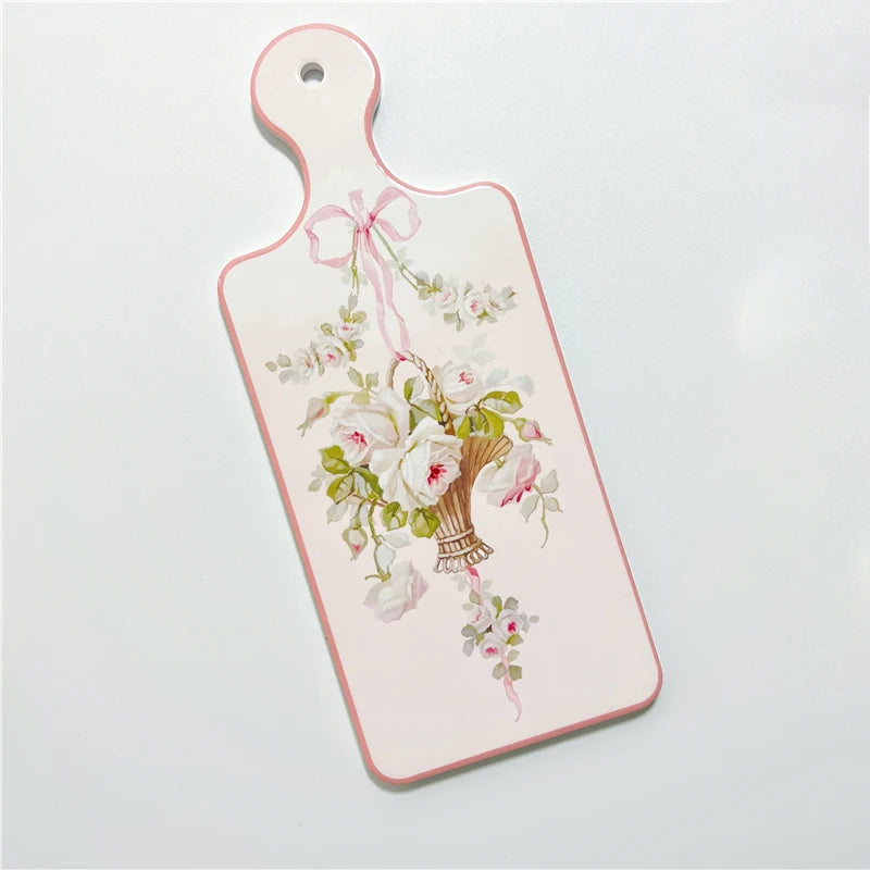 planche découper céramique vintage fleurs roses motifs géométriques blanc roseclair