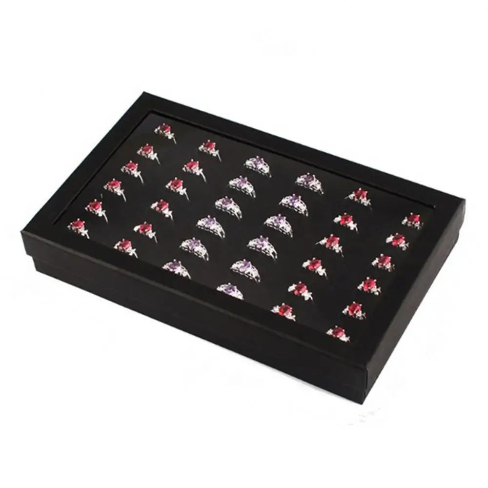 boîte rangement bijoux velours noir contemporaine compartiments anneaux boucles doreilles organisation présentoir