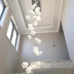 lustre moderne blanc transparent cubes géométriques suspension câbles blancs lumière chaude lumière froide 30w
