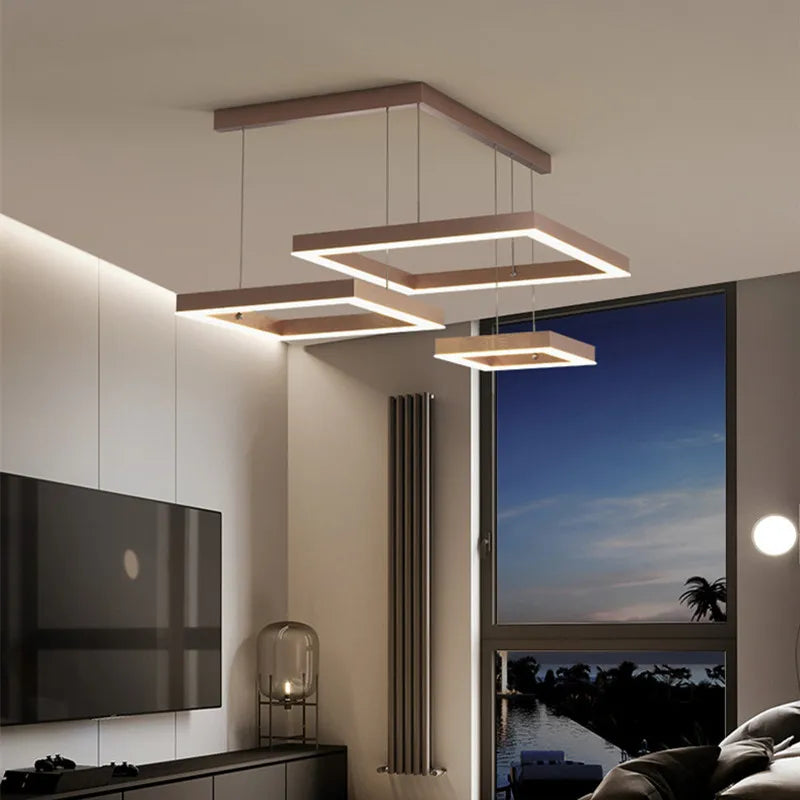 Installation de la suspension LED au-dessus d'une table à manger moderne