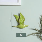 Comparaison des différentes couleurs disponibles pour l'oiseau mural