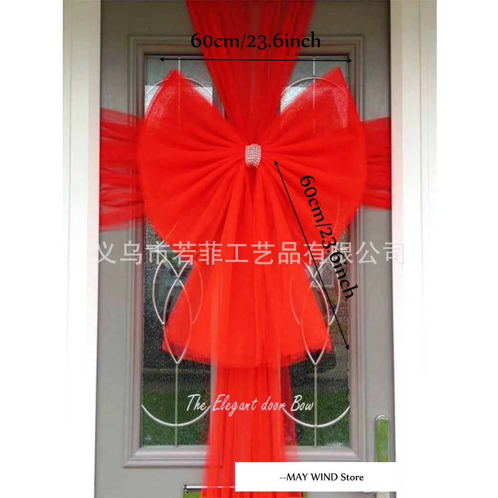 Décoration de porte avec nœud organza pour mariage