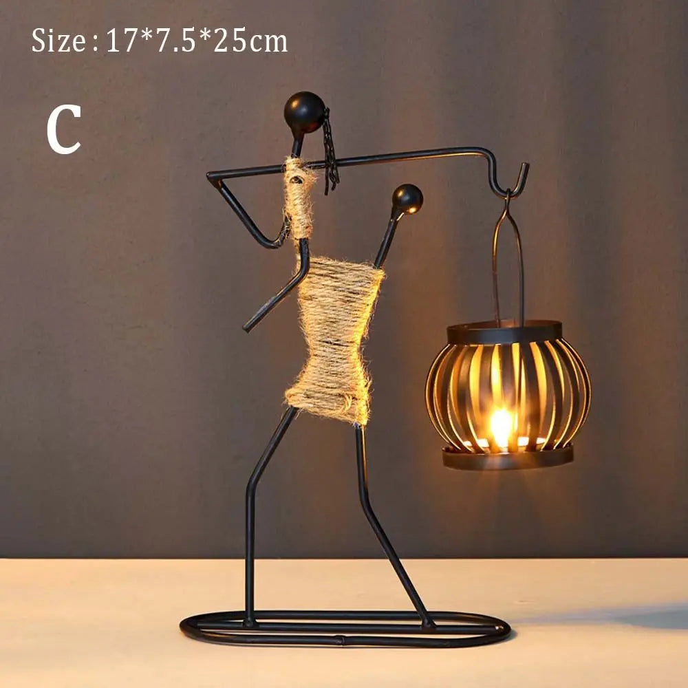 lanterne moderne minimaliste métal noir suspension bougie décoration intérieure contemporain porte chandelier abstrait