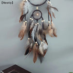 attrape rêves traditionnel plumes noir bleu beige marron gris decoration interieur artisanal