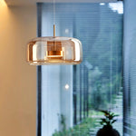 luminaire suspension moderne verre transparent doré câble salon salle manger