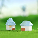 décoration miniatures maison blanc brun bleu vert orange toits vagues minimaliste cartoon like