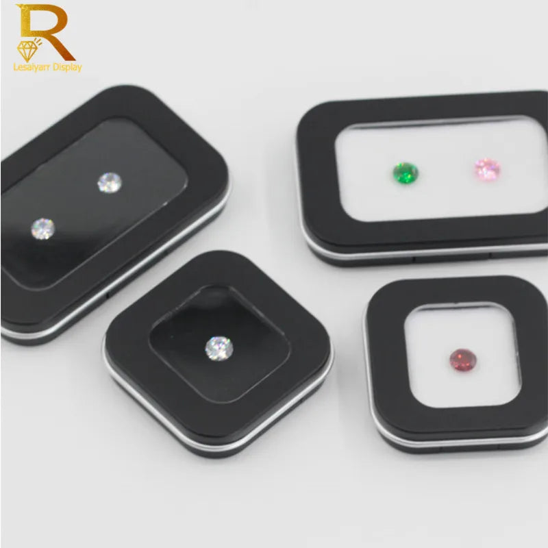 boîtes bijoux noir velours moderne diamants blanc rose vert fentes rectangulaires exposé