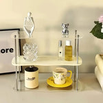 étagère deux niveaux transparente moderne pieds métalliques rangement parfum vaisselle décoratives multifonctionnelle salon