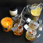 supports bougies acier inoxydable centrage diy fabrication moderne lignes horizontales gravées clips wick holders