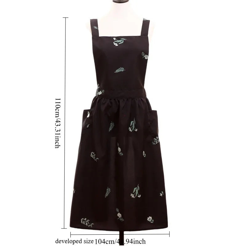 tablier cuisine noir fleurs blanches coton polyester plissé croisé dos poches classique imperméable