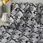 tissu polyester jacquard fleurs noires blanches classique velouté résistant opaco 140cm coudre