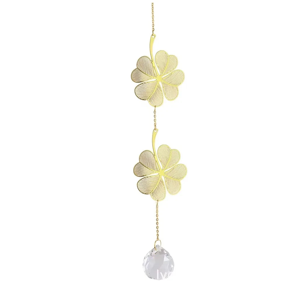 mobile décoratif doré transparent fleurs feuilles cristal chaîne dorée artisanal élégant fenêtre