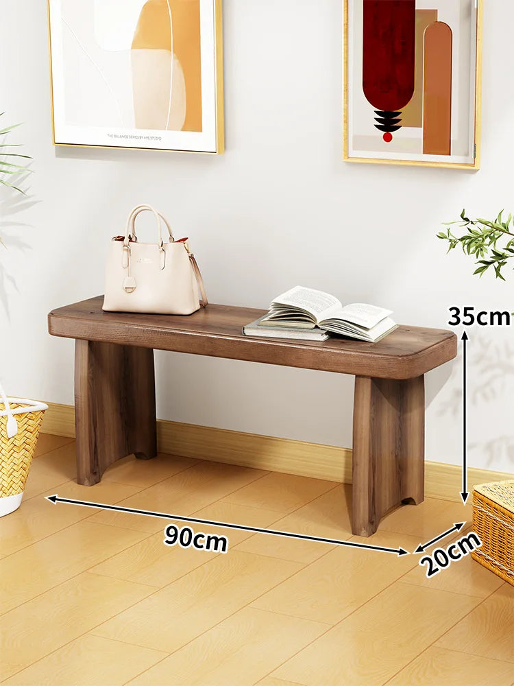 Banc bois marron clair texture naturelle moderne salon tabouret sac main livre ouvert decoration