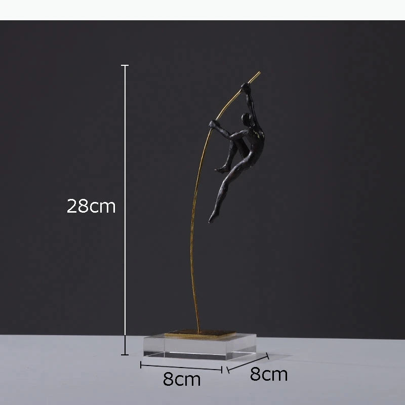 sculpture contemporaine noir doré forme humaine stylisée base transparente anneau métallique minimaliste ornement salon
