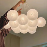 suspension lumineuse moderne blanc texture tissée boules verre fixation flux lumineux 2000 82000